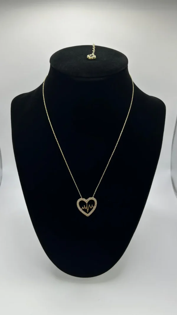Cadena de corazón con dije