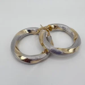 Argollas torcidas con detalles oro blanco