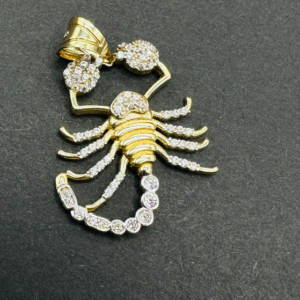 Dije de scorpion